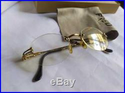 A nice vintage Fred orcade frameless unisex eyeglasses