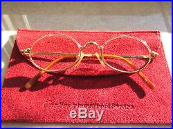 Women's Cartier prescription eyeglasses with gold frame. Immaculate condition